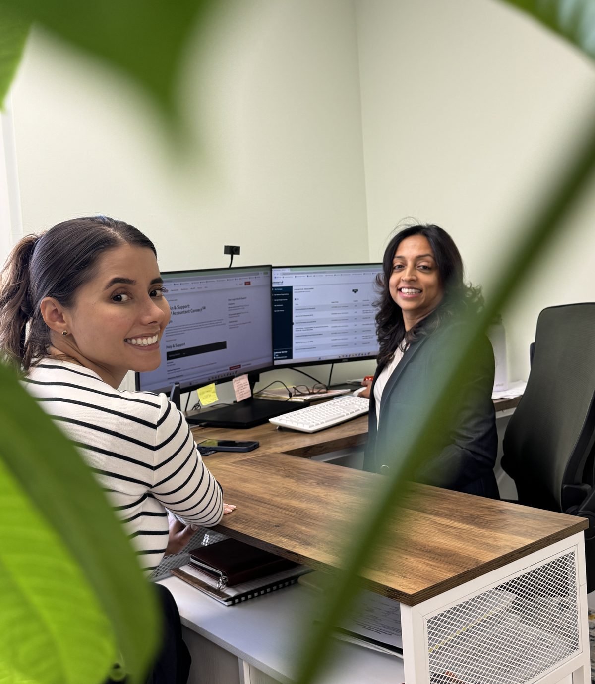 Accountit CPA team members at their desks in the Weston, FL office